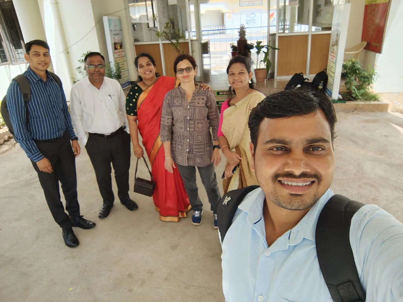 Lijoys Solutions team members posing together at the GTTC campus — the team behind the training programs
